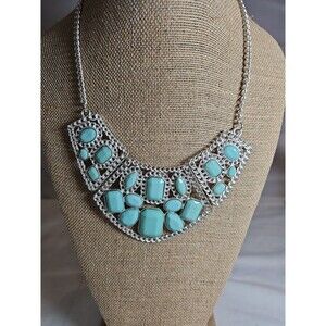 Silver tone necklace with light green sets